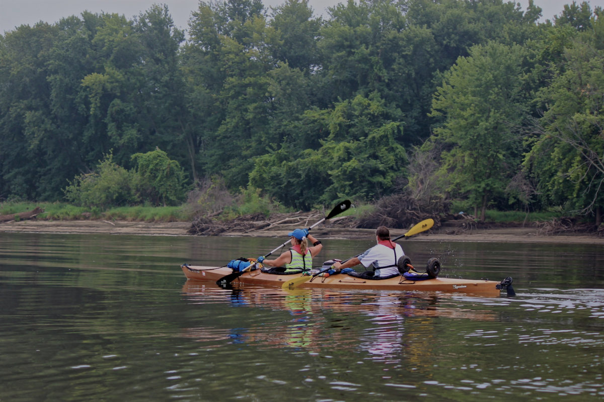 South of Dubuque, Iowa, a couple new friends accepted an invitation to paddle along for a day, and provided rare photos of both Barb and Gene in the kayak together.