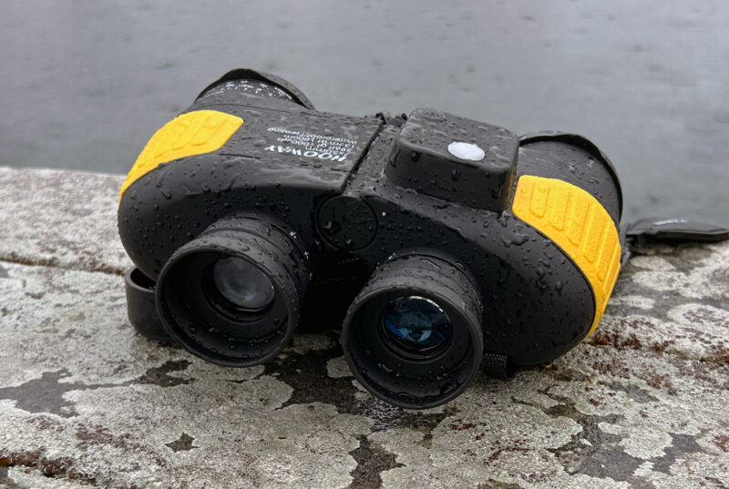 A pair of black and yellow Hooway 7x50 Marine Binoculars.